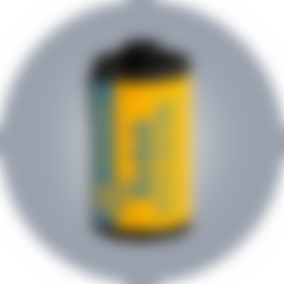 A 20 exposure roll of Kodak Ektachrome slide film and its yellow metal canister with it color coded blue screw top lid, 2018