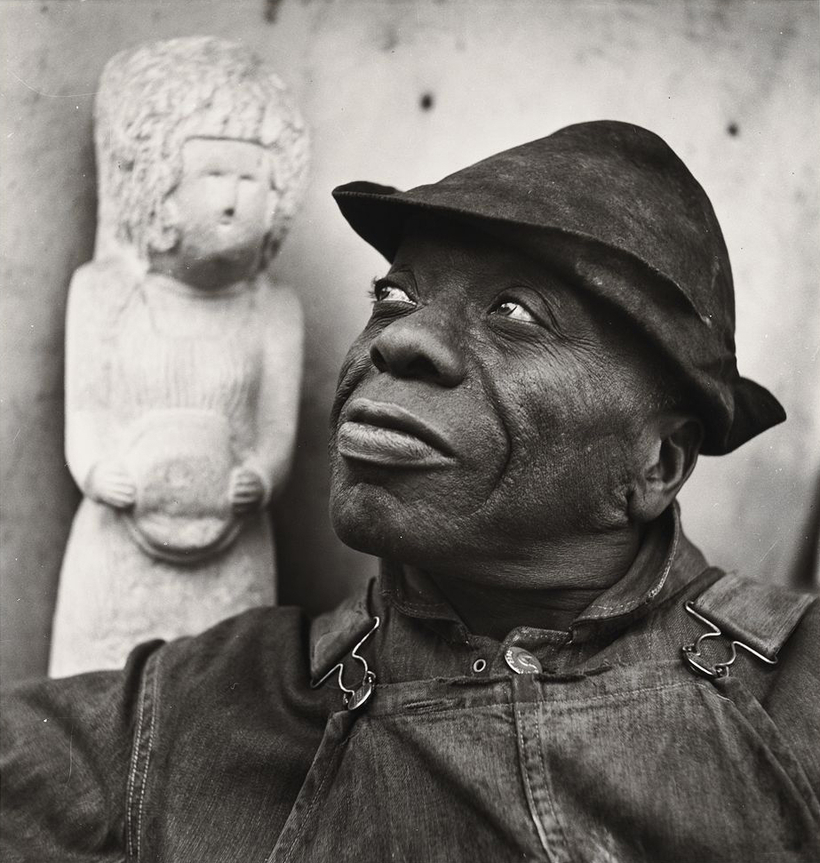 William Edmondson with one of his limestone sculptures in the 1930s, the decade he started making figurative works.