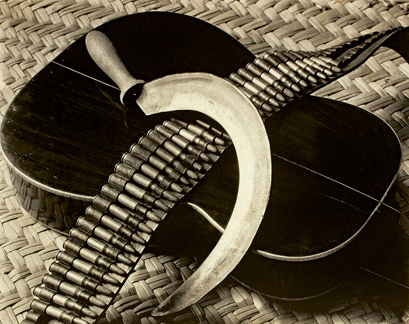 Sickle, Bandolier, Guitar, by Tina Modotti, 1927.